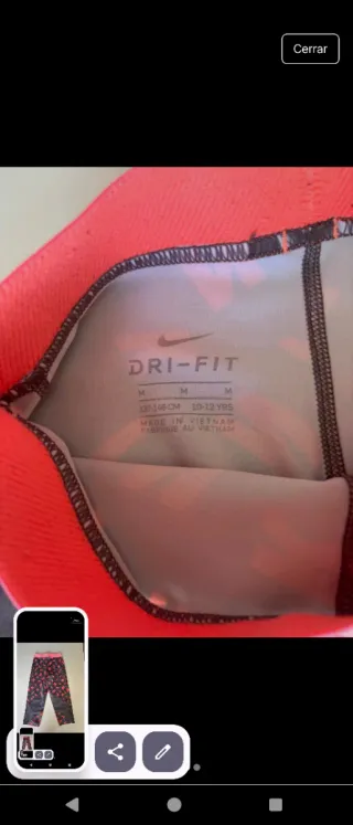 Leggings deportivos Nike grises y rosas