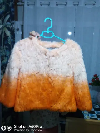 Cazadora pelo beige y naranja