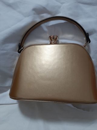Bolso de fiesta dorado brillante