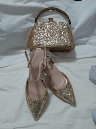 Bolso de fiesta dorado brillante