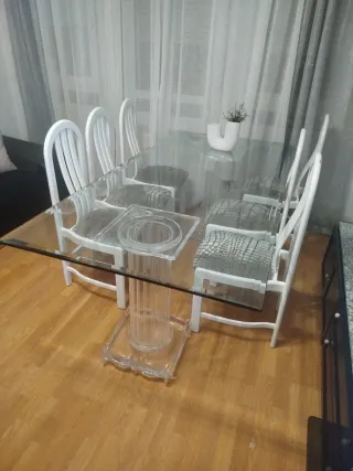 Mesa de comedor de cristal moderna con seis sillas