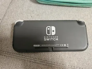 Nintendo Switch Lite Grigio + Custodia Verde