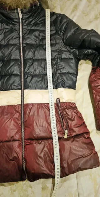 Piumino con cappuccio e pelliccia