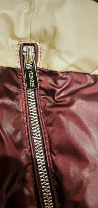 Piumino con cappuccio e pelliccia