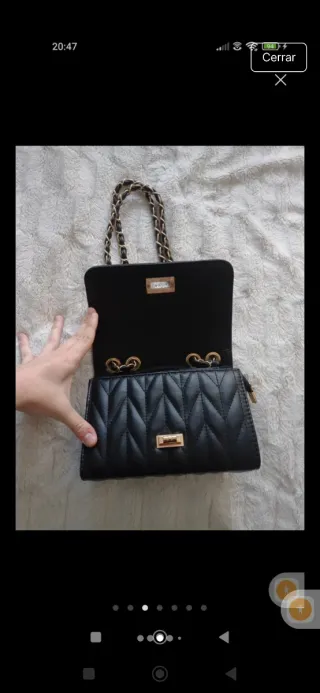 Bolso de fiesta negro con cadena dorada