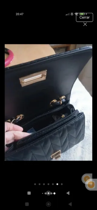 Bolso de fiesta negro con cadena dorada