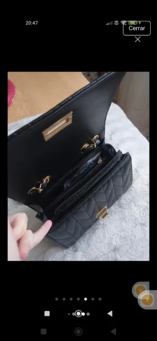 Bolso de fiesta negro con cadena dorada