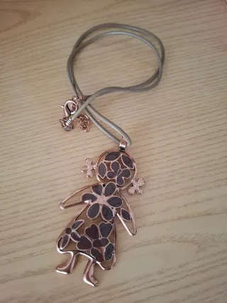 Colgante muñeca acero rosa y cuero