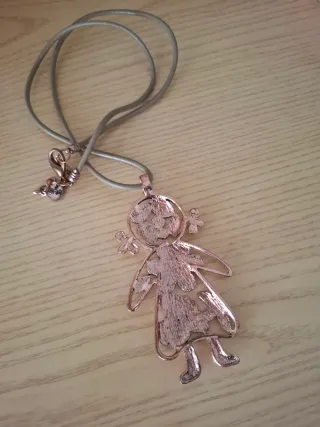 Colgante muñeca acero rosa y cuero