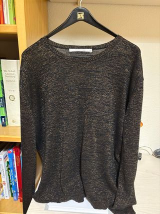 Jersey Bimba y Lola negro con brillos dorados.