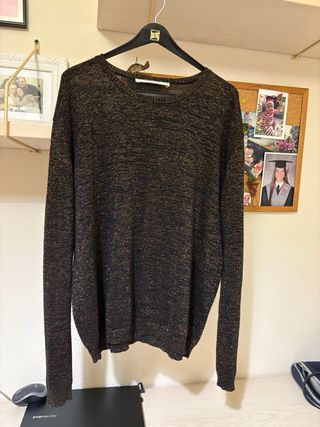 Jersey Bimba y Lola negro con brillos dorados.