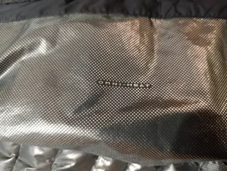 Chaqueta Columbia Negra. De plumas, ligera.