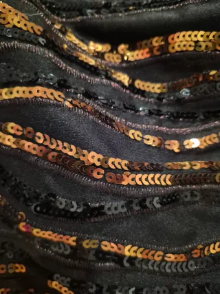 Falda corta lentejuelas negras y doradas/marròn.