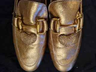 Mocasines Uterqüe dorados talla 41