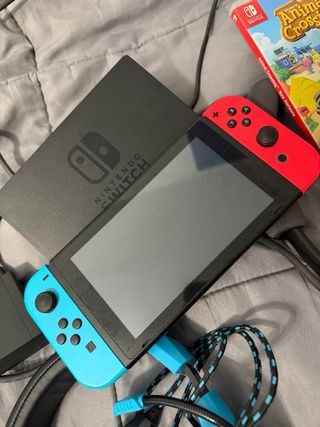 Nintendo Switch + 3 Giochi + Cuffie
