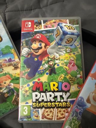 Nintendo Switch + 3 Giochi + Cuffie