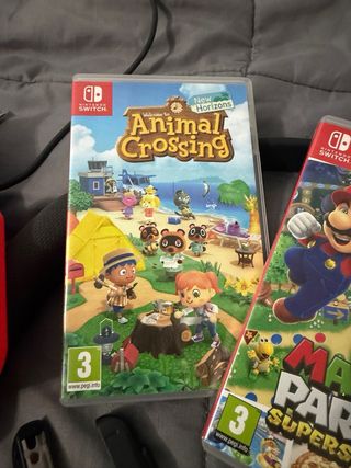 Nintendo Switch + 3 Giochi + Cuffie