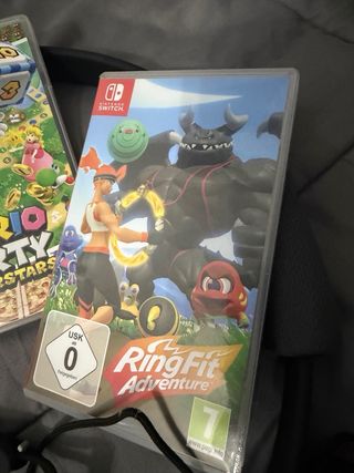 Nintendo Switch + 3 Giochi + Cuffie