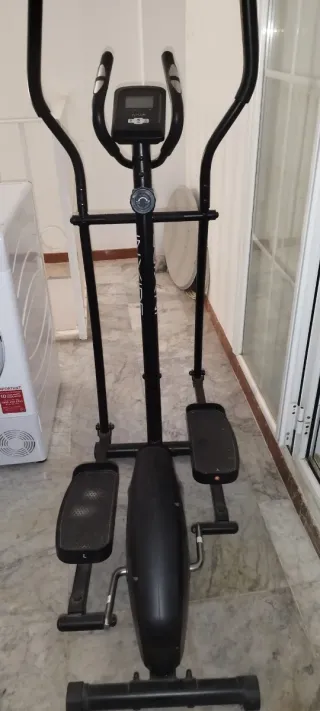 Bicicleta elíptica y tabla multifunción