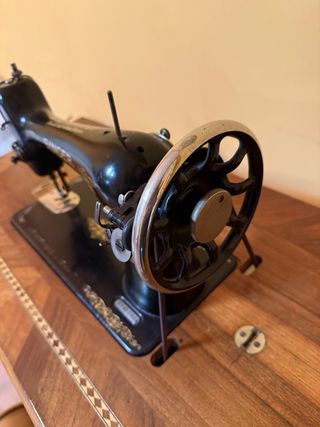 Máquina de coser Singer antigua funciona perfecto