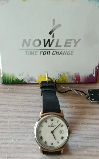 Reloj Nowley Cuarzo Suizo. Nuevo.