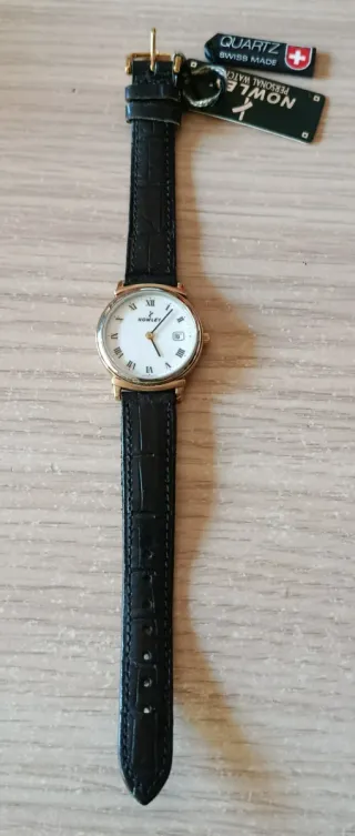 Reloj Nowley Cuarzo Suizo. Nuevo.