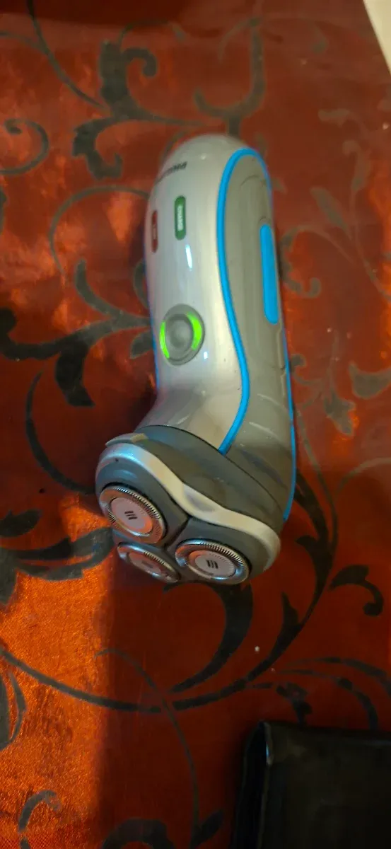 Máquina de afeitar Philips gris y azul