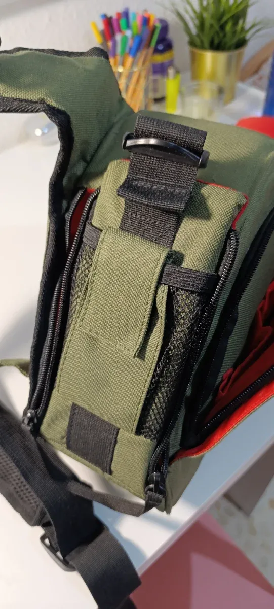 Mochila bandolera verde para cámara