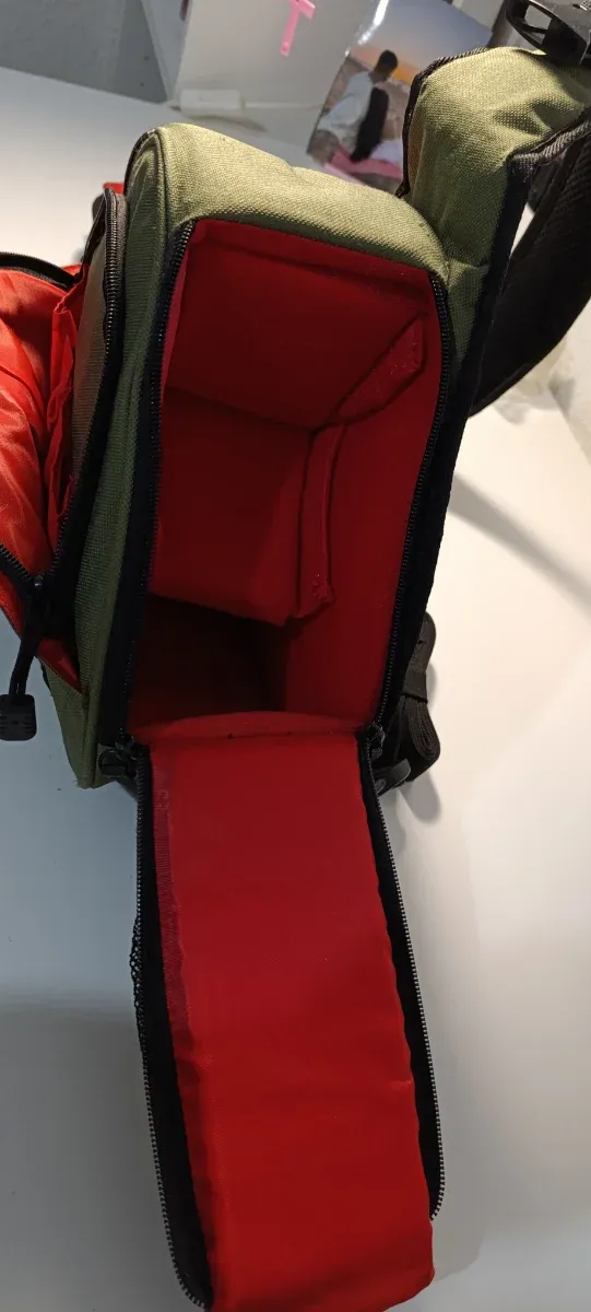 Mochila bandolera verde para cámara