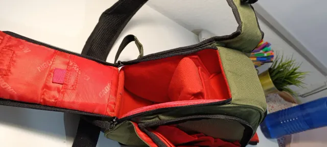 Mochila bandolera verde para cámara