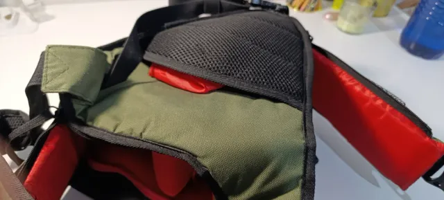 Mochila bandolera verde para cámara