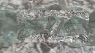 Pañuelo de tela gris y verde. Sin uso