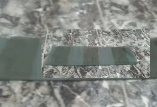 Pañuelo de tela gris y verde. Sin uso