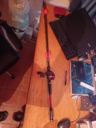 Caña y carrete ultimate cast sin usar