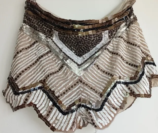 Falda lentejuelas negra chaleco short