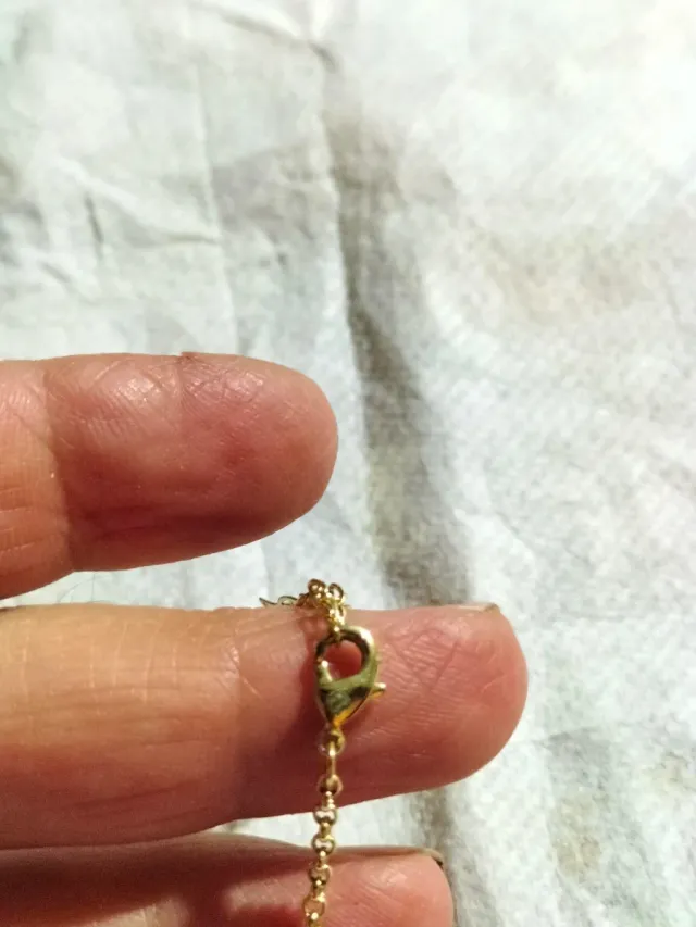 Conjunto chapado oro con piedras verdes