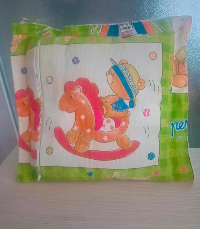 Cojín infantil con balancín