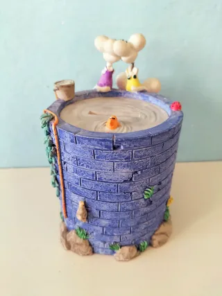 Salvadanaio con Diddl e Diddlina su pozzo desideri