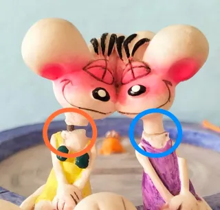 Salvadanaio con Diddl e Diddlina su pozzo desideri