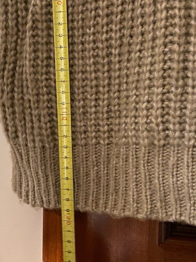 Chaqueta larga de punto beige