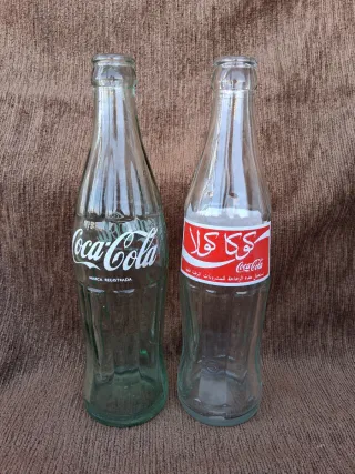 Bottiglie antiche di Coca-Cola