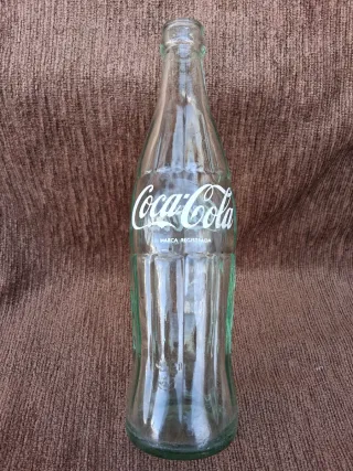 Bottiglie antiche di Coca-Cola