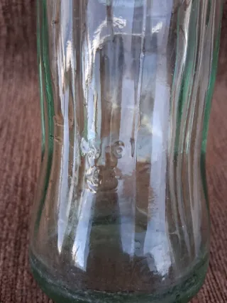 Bottiglie antiche di Coca-Cola