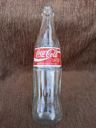 Bottiglie antiche di Coca-Cola