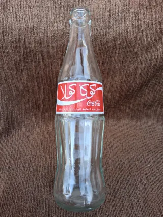 Bottiglie antiche di Coca-Cola