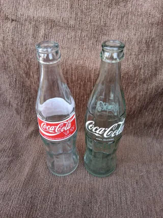 Bottiglie antiche di Coca-Cola