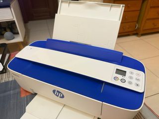 Impresora HP Azul y Blanca