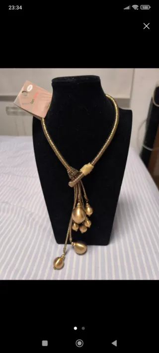 Conjunto collar y anillo dorado