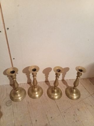 Juego de 4 candelabros de metal