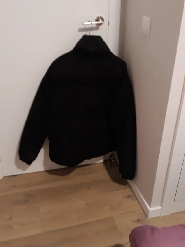 Plumífero negro hombre